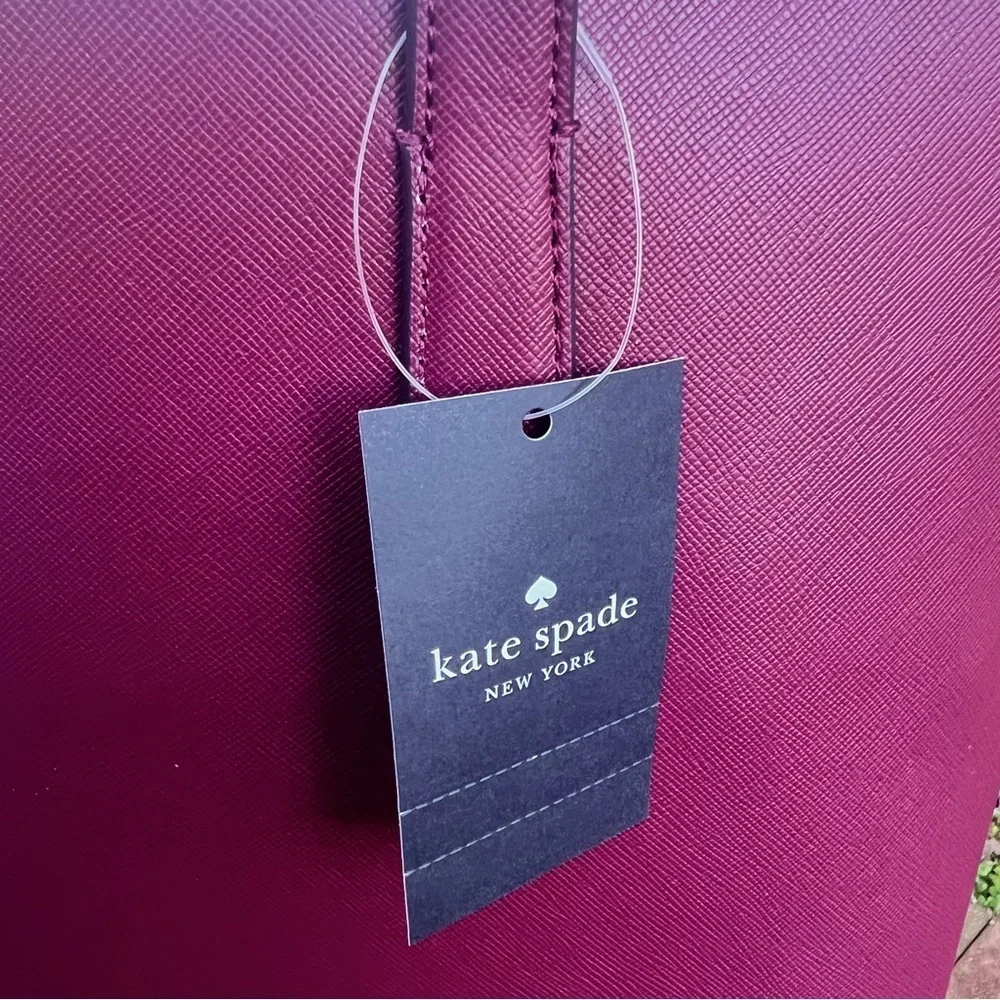 Kate Spade 3 piece set with tote wristlet and pouch
